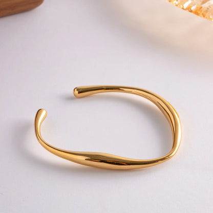 Twisted Gold Bangle | Hypoallergenic Stainless Steel-Plated 18k Gold 3