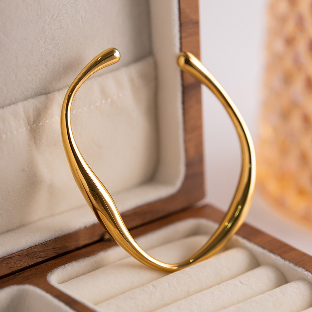 Twisted Gold Bangle | Hypoallergenic Stainless Steel-Plated 18k Gold 4