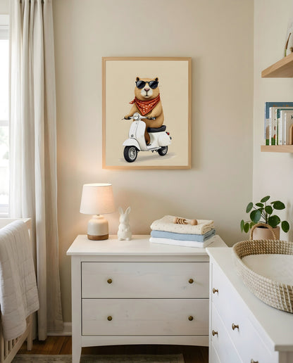 Nursery Capybara Scooter Retro Graphic Wall Art — hung above a dresser on a warm-toned wall