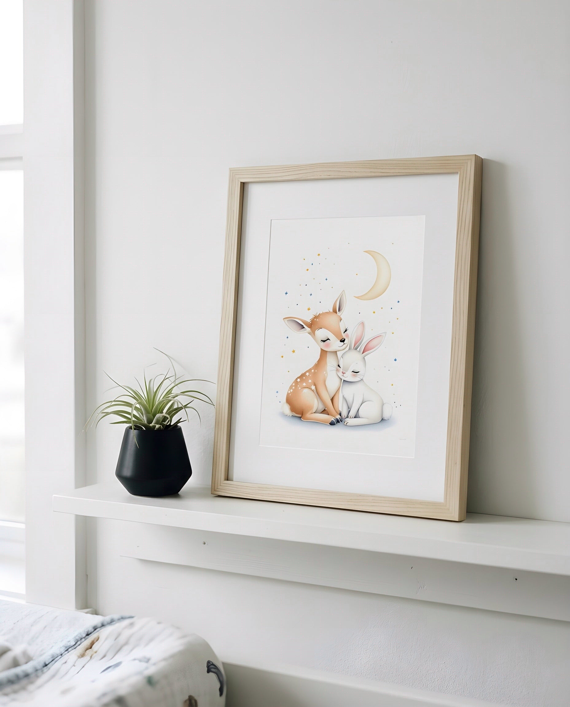 Nursery Deer Bunny Moon Soft Watercolor Printable Wall Art — propped on a shelf with decor