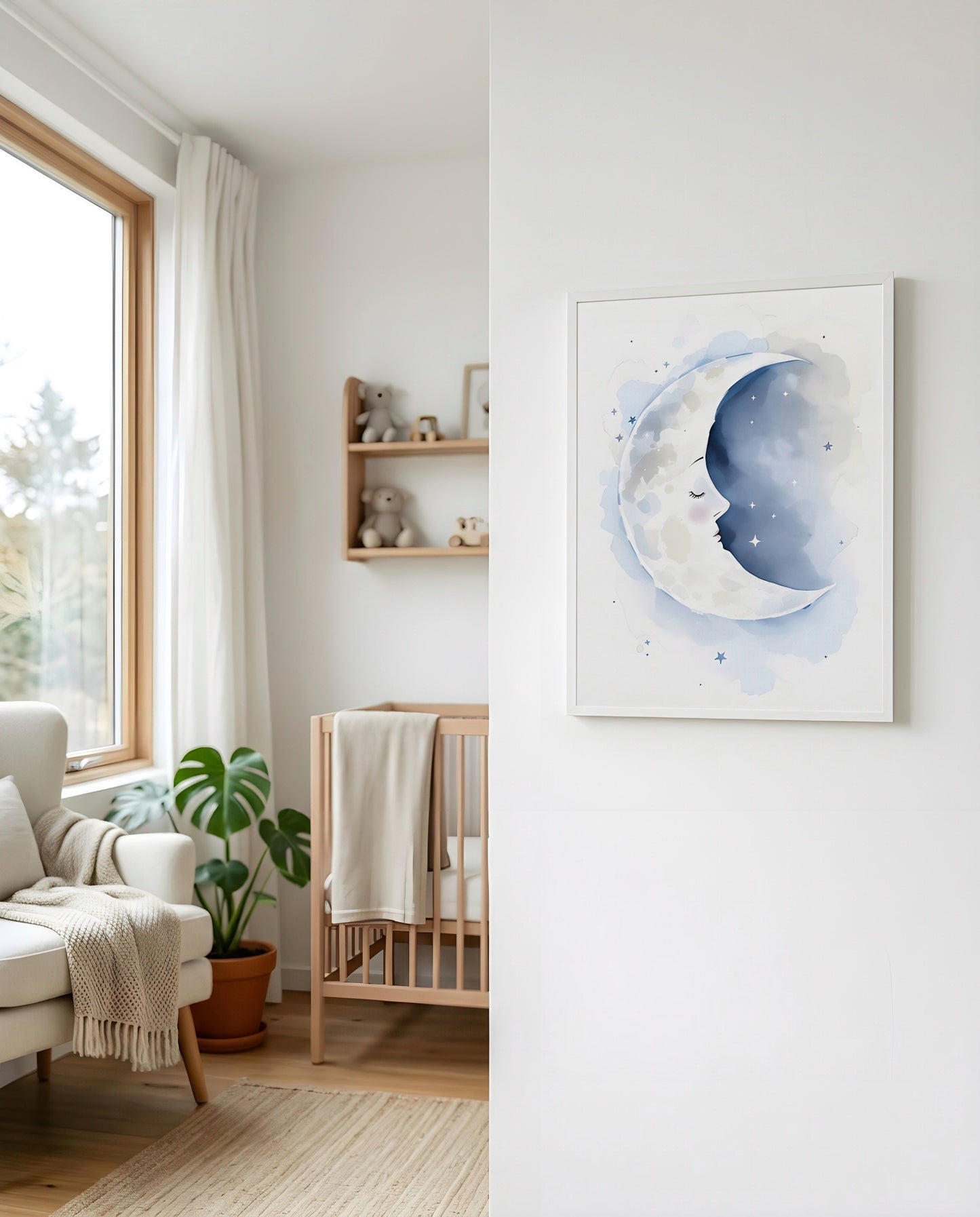 Nursery Sleeping Moon Minimal Watercolor Printable Wall Art — displayed beside a window in warm natural light